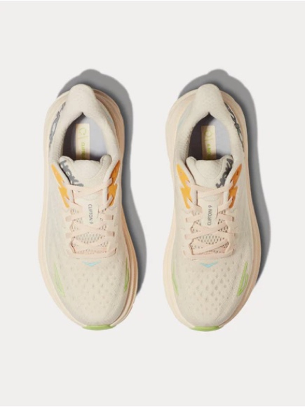 Hoka Women's Cream Running Shoes with Yellow and Green Accents